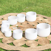 Set of 9 White Crystal Singing Bowls in Beige Bags