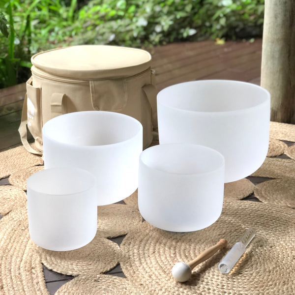 Load image into Gallery viewer, White Crystal Singing Bowls Set of 4 with Beige Bag
